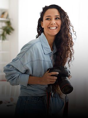 Fotograaf met camera in hand - fotografie