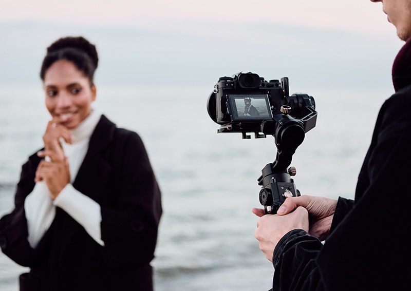 Videographer films girl- BrandB